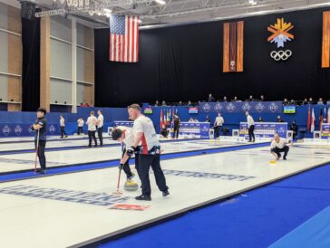 Norwegian curlers sweep the stone delivered by vice skip Wilhelm Naess, right, during a game against Sweden at the 2026 World Men's Curling Championship at the Weber County Ice Sheet in Ogden, Utah, on Monday, March 30, 2026. (Ryan Olson, Standard-Examiner)